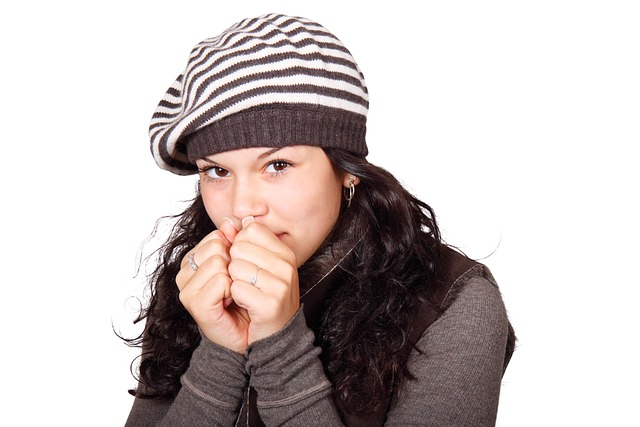 shivering woman wondering how long to replace a broken water heater in Everett