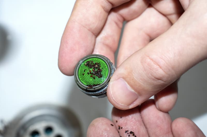 A clogged aerator is one of the reasons for Low Water Pressure In the Kitchen Sink