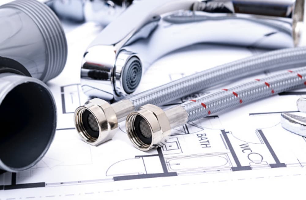 plumbing remodel blueprint with pipes drained on top of them